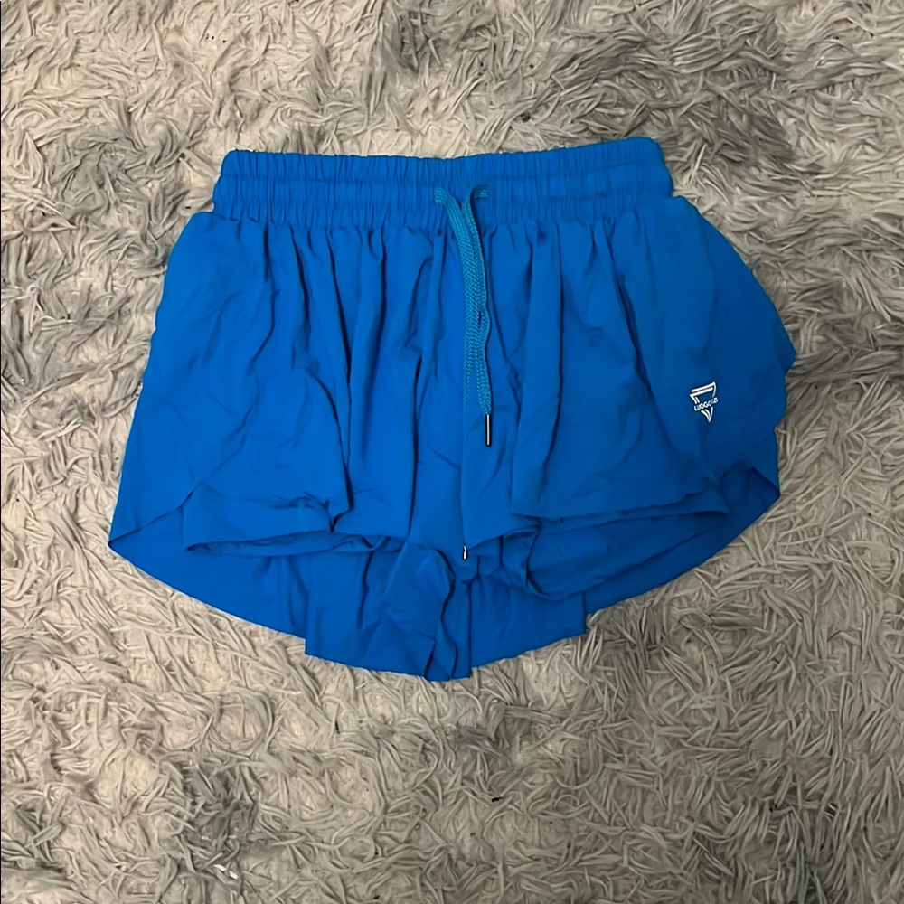 Blue butterfly athletic shorts
